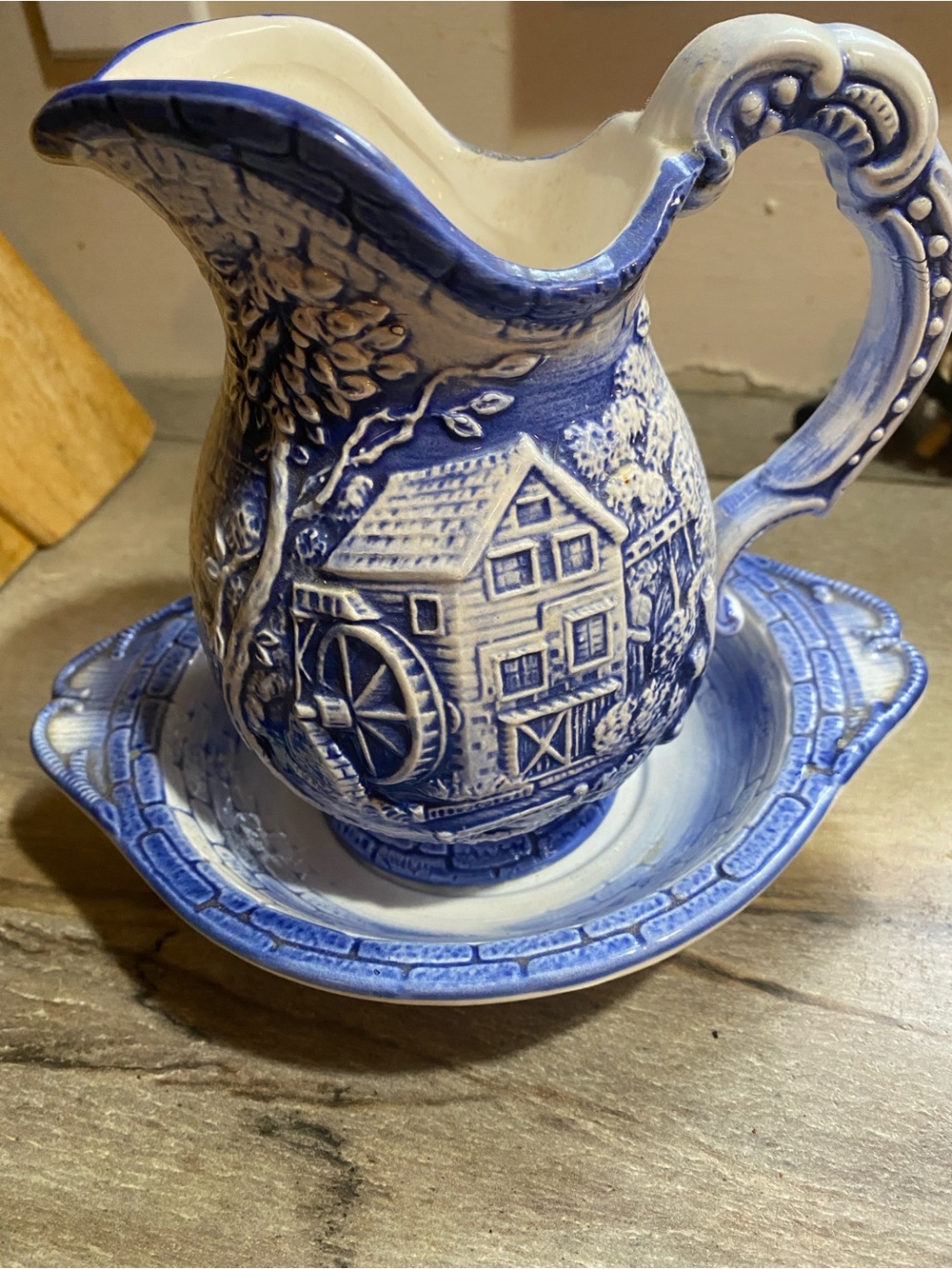 Vintage glass pitcher with saucer